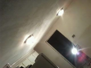Kitchen lights and plastered wall
