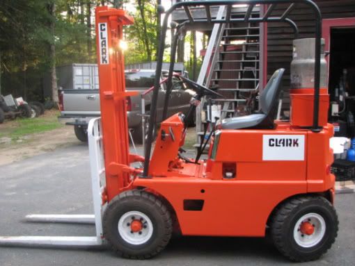How do you change the transmission fluid in a forklift?