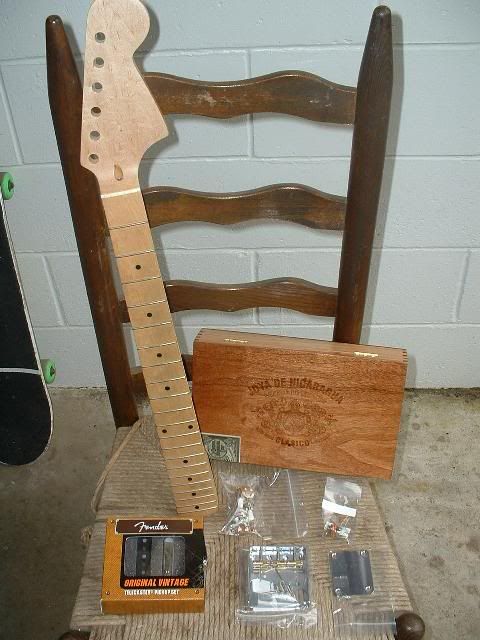 http://i3.photobucket.com/albums/y67/silenceisconsent/guitar/cigarbox001.jpg
