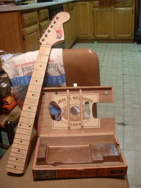 http://i3.photobucket.com/albums/y67/silenceisconsent/guitar/cigarbox0029.jpg
