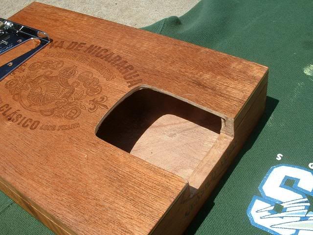 http://i3.photobucket.com/albums/y67/silenceisconsent/guitar/cigarbox008.jpg
