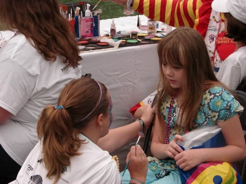 Caity getting her face painted