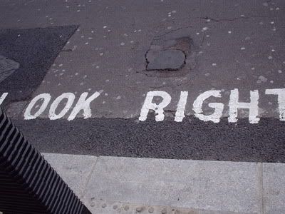 These warnings were painted at crosswalks to remind tourists which way to check for passing cars.