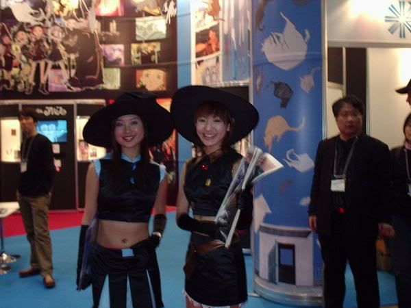 Cute con girls advertising Mahou Shoujo Arisu.