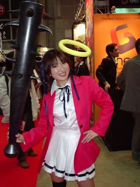 Remember when I told you about the anime series that revolves around an angel who comes to earth, keeps beating her host to death and then remorsefully resurrecting him, and gets explosive diarrhea if her halo is removed?  This is a woman advertising that show.  No, I did not yank on her halo to see what would happen.